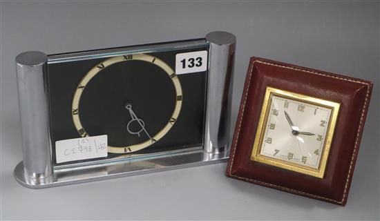 An Art Deco-style chrome desk timepiece and an alarm clock